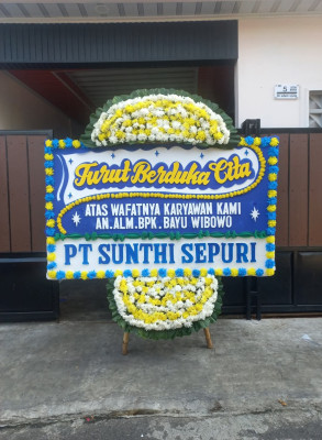 Papan Bunga Duka di Benda Baru