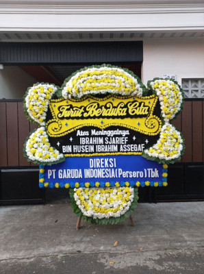 Papan Bunga Duka di Benda Baru